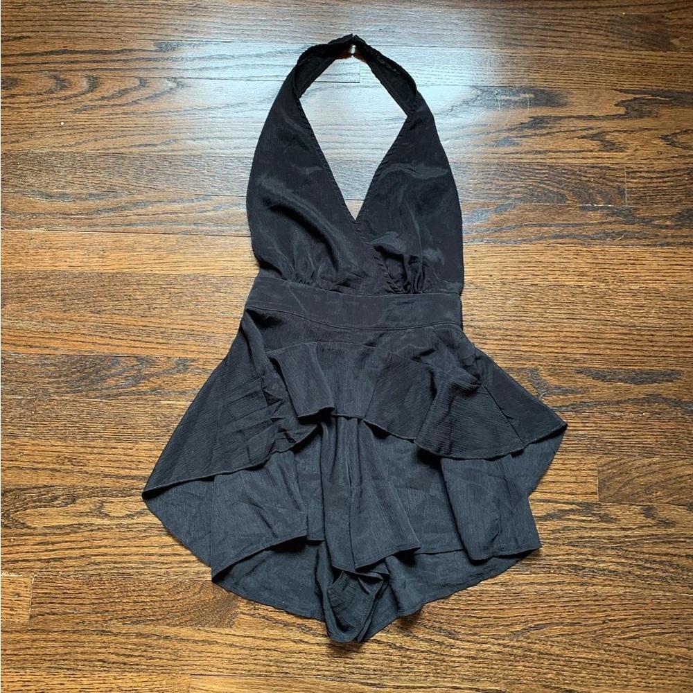 Pretty little thing black halter neck open back ruffle playsuit romper.